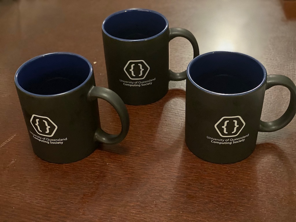The committee tried giving out coffee mugs to people who did talks